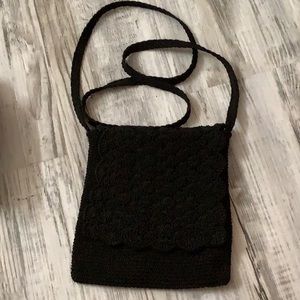 Woven crossbody bag With a nice long strap black braided look.